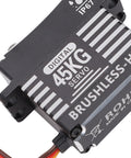 Hardcore Brushless Servo Featuring Heavy Duty Metal Gears And Aluminum Body 45Kg Torque No Sweat Performance Compact Fit For RC Cars Trucks and Off Road Rigs close-up view of digital 45kg servo with steel internals.