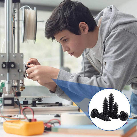 Boy assembling a device with Heavy Duty Carbon Steel M1.4 Self Tapping Wood Screws Pan Head Cross Recessed Assortment Kit 500 Pc.