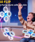 Child playing with Kids Friendly LED Drone With Propeller Guards And 360 Flips, 3 Batteries For Up To 24 Minutes, remote control.
