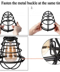 Metal Light Cage Guard 4 Pack being assembled, showing hands fastening metal buckle around black cage for pendant lights.