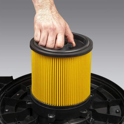 Hand installing Standard Cartridge Filter And Retainer For Dry Pickup Only In 5 To 16 Gallon Wet And Dry Vacuums Ideal For Household Dirt Debris And Sawdust Compatible With Most 5 To 20 Gallon Vacuums Excluding VWM510 Easy Install And Durable Dust Filtration into vacuum base