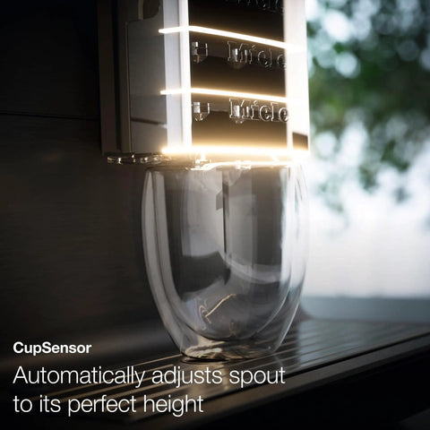Hassle Free Fully Automatic Coffee And Espresso Maker With Built In Milk Frother, Quiet Grinder, One Touch Brewing, Programmable Daily Timer, Top Shelf Kitchen Essential showing CupSensor adjusting spout height.