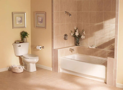 Sage Traditional Double Post Toilet Paper Holder Brushed Nickel Finish mounted beside a toilet in a modern bathroom setting.