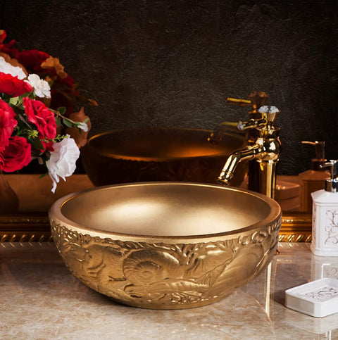Super Slick Round Vessel Sink For Bathroom Vanity Killer Gold Ceramic Countertop Wash Basin with decorative design on a marble surface.