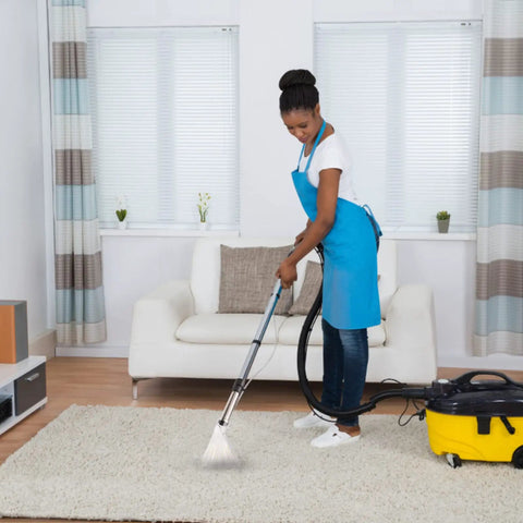 Woman using Extractor Attachment For Wet Dry Vac Turn Any Shop Vac Into A Pro Grade Upholstery Cleaner on carpet