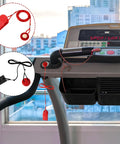 Two Pack Universal Treadmill Magnet Safety Key With Clip And Emergency Stop Replacement shown on treadmill console in gym