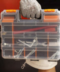 Person holding Grab And Go Double Sided Tool And Hardware Storage Box With Removable Dividers Portable Small Parts Organizer
