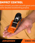Pro Grade O1 Tool Steel Low Angle Block Plane in hand, compact design for heavy duty wood smoothing and fine carpentry work.