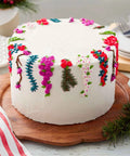 Decorated cake with floral icing designs using Twist Quick Decorating Coupler 4 Piece Set For Cakes And Icing