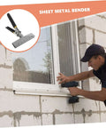 Worker installing window using Go To Workhorse Hand Seamer Tool And Metal Bender For Sheet Metal Flattening with drill.