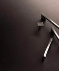 Flex Square Knob 7 Pack Satin Nickel and Gold One and a Quarter Inch Contemporary Cabinet Hardware displayed on dark surface.
