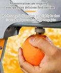 Heavy Duty Manual Commercial Electric Juicer Press With Corer And Double Blades For Large Fruits, extracting juice from an orange.