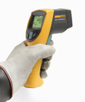 Boss Level HVAC Pro Infrared Thermometer With Dual Infrared And Thermocouple Modes, Reads Minus Forty To One Thousand Twenty Two Degrees Fahrenheit (Forty To Five Hundred Fifty Celsius), Perfect For HVAC And Refrigeration, Electrical, And Industrial Work. Handheld infrared thermometer in gloved hand