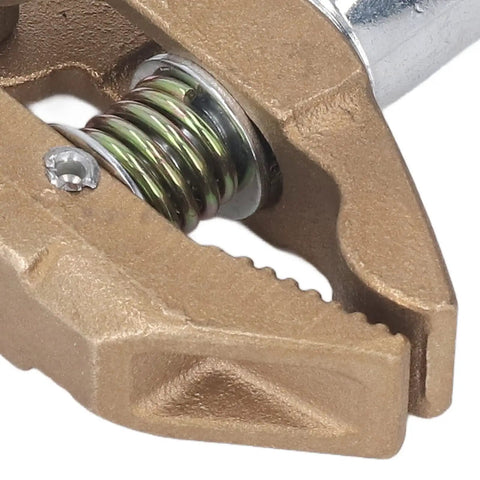 Close-up of Heavy Duty 800A Grounding Brass Welding Clamp With Rubber Sleeve, showing strong jaws and internal spring.