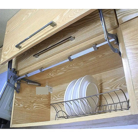 Vertical Lift Up Cabinet Hinge 250N Flap Support shown in an open wooden kitchen cabinet with plates inside