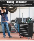Mechanic using a 7 Drawer Metal Rolling Tool Chest On Wheels With Locking System Heavy Duty Tool Storage Cabinet in workshop