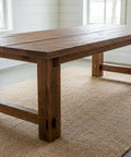 Hella Durable Reactive Water Based Voc Free Interior Wood Stain 55 Gallon used on rustic wood dining table with natural tones.