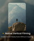 Person standing on rock in mountains, showcasing Your Go To Ultra Light Drone With 4K Video, 8K Photo, Sub 249g Build features.