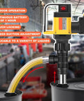 Handheld Cordless Oil Pump With 2 Batteries And 100W Motor For Liquid Transfer Adjustable Speed Up To 7M Lift near a drum with flexible hose.