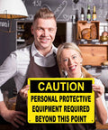 Two people holding a PPE Sign Personal Protective Equipment Required Beyond This Point 8x12 Inch Aluminum Metal Sign