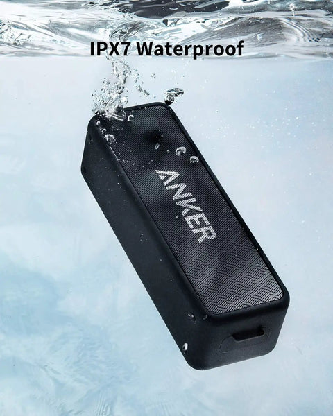 Beefy Bass Portable Bluetooth Speaker With Crisp Stereo Sound, IPX7 Waterproof speaker submerged in water, highlighting durability.