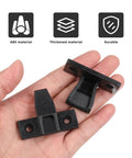 20 Piece Push On Furniture Panel Clips With Dead Easy Hidden Cabinet Mounting And Quick Fit Shelf Brackets In Tough Black Nylon shown in hand, ABS material construction.