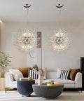 Dope Modern Crystal Firework Chandelier With 12 Lights In Chrome Stainless Steel Sputnik Style Dandelion Pendant Ceiling Light Fixture For Bedroom Dining Living Room Rainbow Prism Glow When On in a living room.