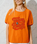 Woman wearing orange shirt with 'Team Punch' design, Dope Viral Monkey DTF Transfers Pack For DIY Tees And Shirts 7x7 Ready To Press Heat Transfer Stickers