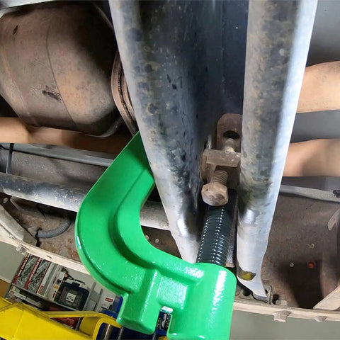 Beefy Heavy Duty Torsion Bar Removal Tool With Extended C Frame And Ford Dodge Adapter in auto repair setting