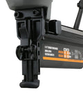 Close-up of a Go-To Pneumatic Sixteen Gauge Straight Finish Nailer showing nail entry point and tool details for trim and molding projects.