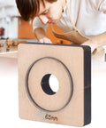 65mm Circular Leather Hole Punch Die For DIY Leatherworking Projects And Card Holders Purses Belts And More With Clean Shiny Edges And Pro Grade Durable Alloy Steel Construction Your Go To Tool For Precise Holes shown with craftsman in background