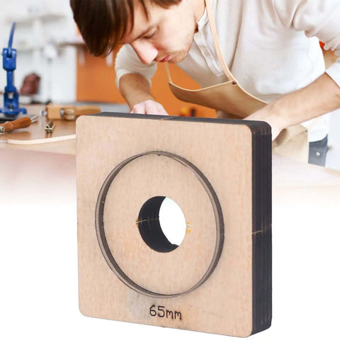 65mm Circular Leather Hole Punch Die For DIY Leatherworking Projects And Card Holders Purses Belts And More With Clean Shiny Edges And Pro Grade Durable Alloy Steel Construction Your Go To Tool For Precise Holes shown with craftsman in background