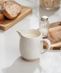 13oz Creamer With Handle Ceramic Pitcher For Coffee, Milk, Syrup And Sauce, Multipurpose Stoneware Jug, white pitcher on table