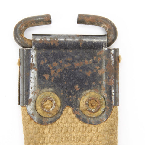 Close-up of WWII British Enfield Web Khaki Sling With Steel Fittings Authentic Dated Military Gear For SMLE Rifles buckle detail