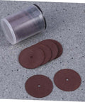 36 Piece Grinding Wheel And Cutting Disc Set for metalworking tools, red discs and storage container on grey surface