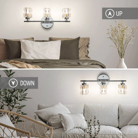 Three Light Crystal Vanity Bathroom Light Fixture, 16 Inch Chrome Over Mirror displayed above beds in cozy rooms with decor.