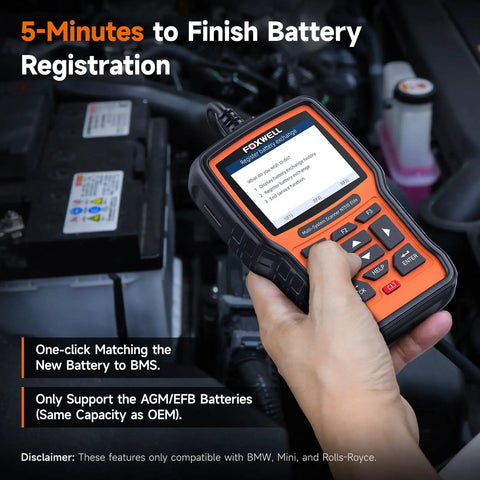 NT510 Elite Scan Tool For BMW Mini Rolls Royce Full Diagnostic Tool OBD2 Scanner held near open car battery