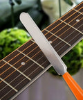 Guitar Luthier Tool Set with fret crowning file on guitar neck for pro grade gear setup on guitar and bass.