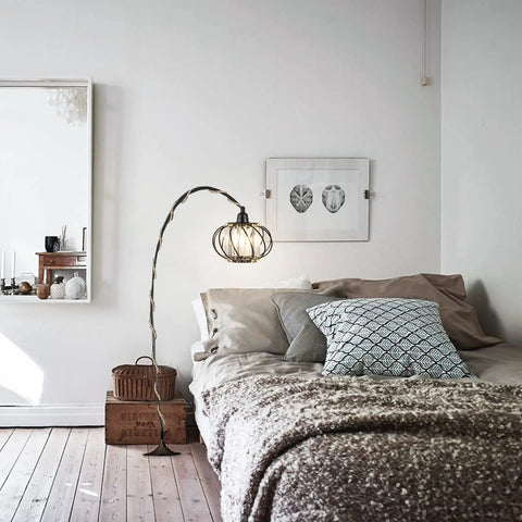 Industrial Pendant Light With Crystal Elements And Plug In Cord, 16.4Ft Hemp Rope Hanging Lamp In Black Cage by bedside in cozy room