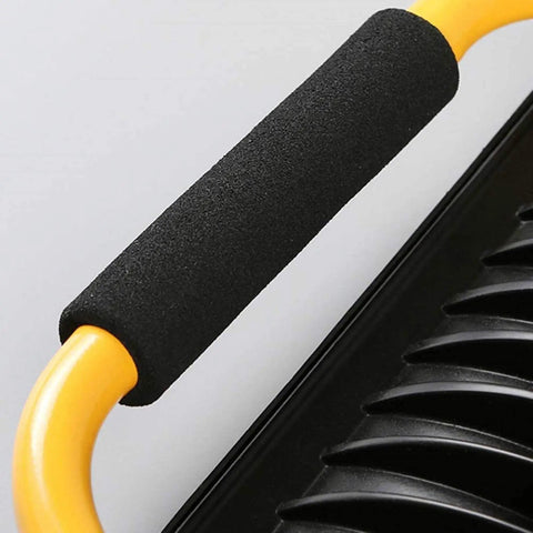 Close-up of Spot Lighting 50W Led Rechargeable Construction Floodlight handle with textured grip for secure use.