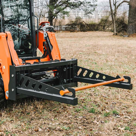 Skid Steer Sod Roller with Adjustable 36in 44in 52in Widths, Universal Quick Tach, attached on skid steer in field