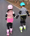 Kids wearing protective butt pads for extreme sports hip pad for skating roller hockey and snowboarding adjustable youth shorts