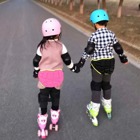 Kids wearing protective butt pads for extreme sports hip pad for skating roller hockey and snowboarding adjustable youth shorts