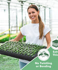 Person holding Upgraded 10 Pack Plant Growing Trays for Seed Starting and Microgreens No Holes No Leakage Durable Reusable Plastic