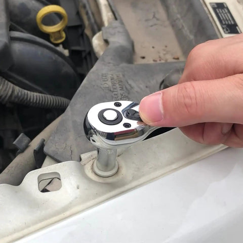Using Do-It-All 1/4-Inch Drive Socket Set With Ratchets And Extensions on a car engine bolt