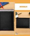 50 Pack Black PE Bubble Mailers With Self Seal Closure, Padded Shipping Envelopes For Ecommerce on wooden table
