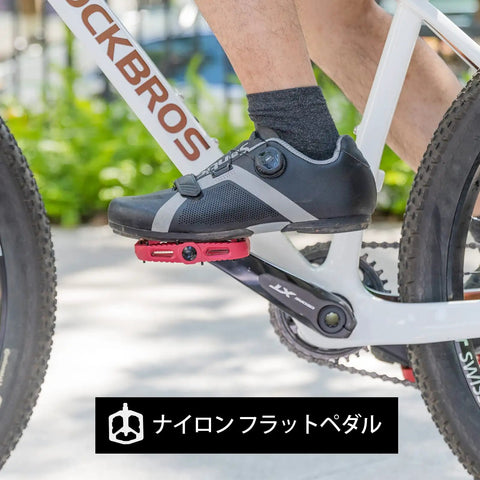 Cyclist using Wide Flat Platform Mountain Bike Pedals 9 By 16 Inch With Nylon Composite Bearings, Red Color, on a bike ride.