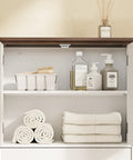 Interior view of Over The Toilet Bathroom Wall Cabinet With Drawer And Adjustable Shelves Floating Medicine Cabinet Organizer For Small Bathrooms Dual Doors White And Brown Space Saver Storage Easy To Install, showcasing toiletries and folded towels.