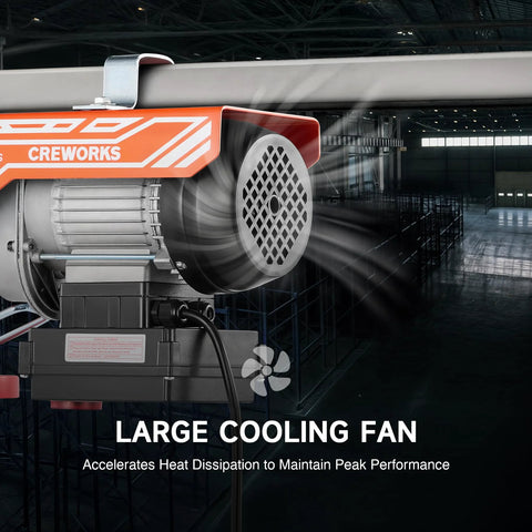 CREWORKS electric hoist mounted to a ceiling beam with orange housing and a large cooling fan
