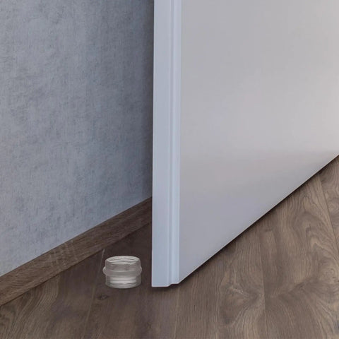 Two Pack Silicone Door Stopper Wedges preventing door slam and finger injuries on wooden floor, home use